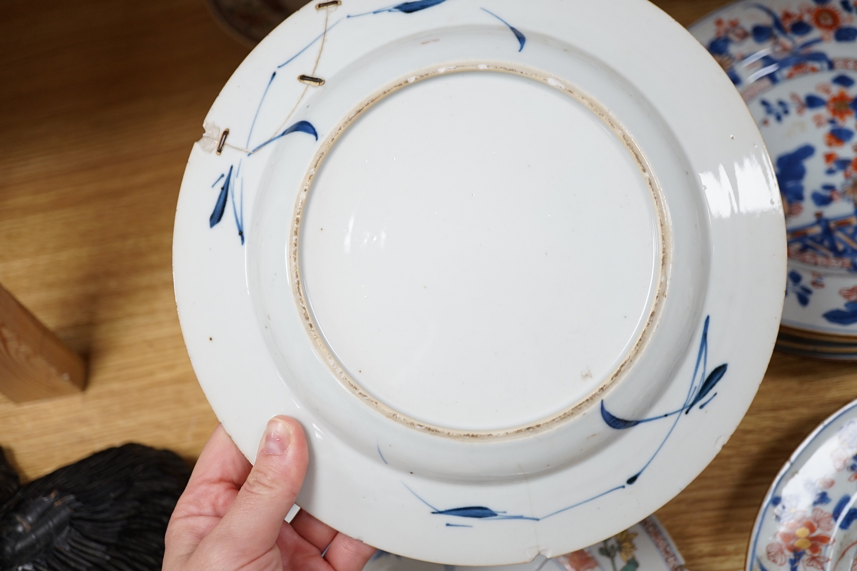 A collection of 18th century Chinese export plates and saucers